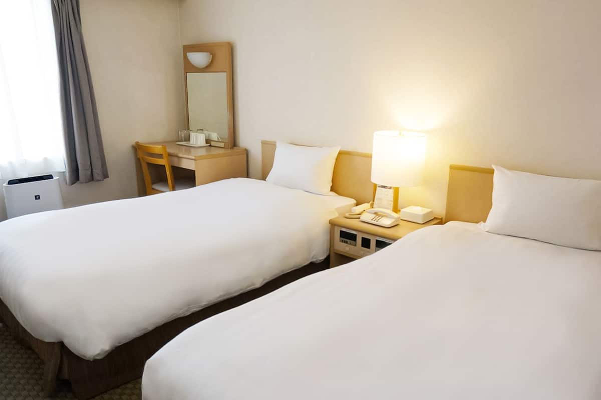 Basic Twin Room, Multiple Beds, Smoking | Down comforters, free WiFi, bed sheets