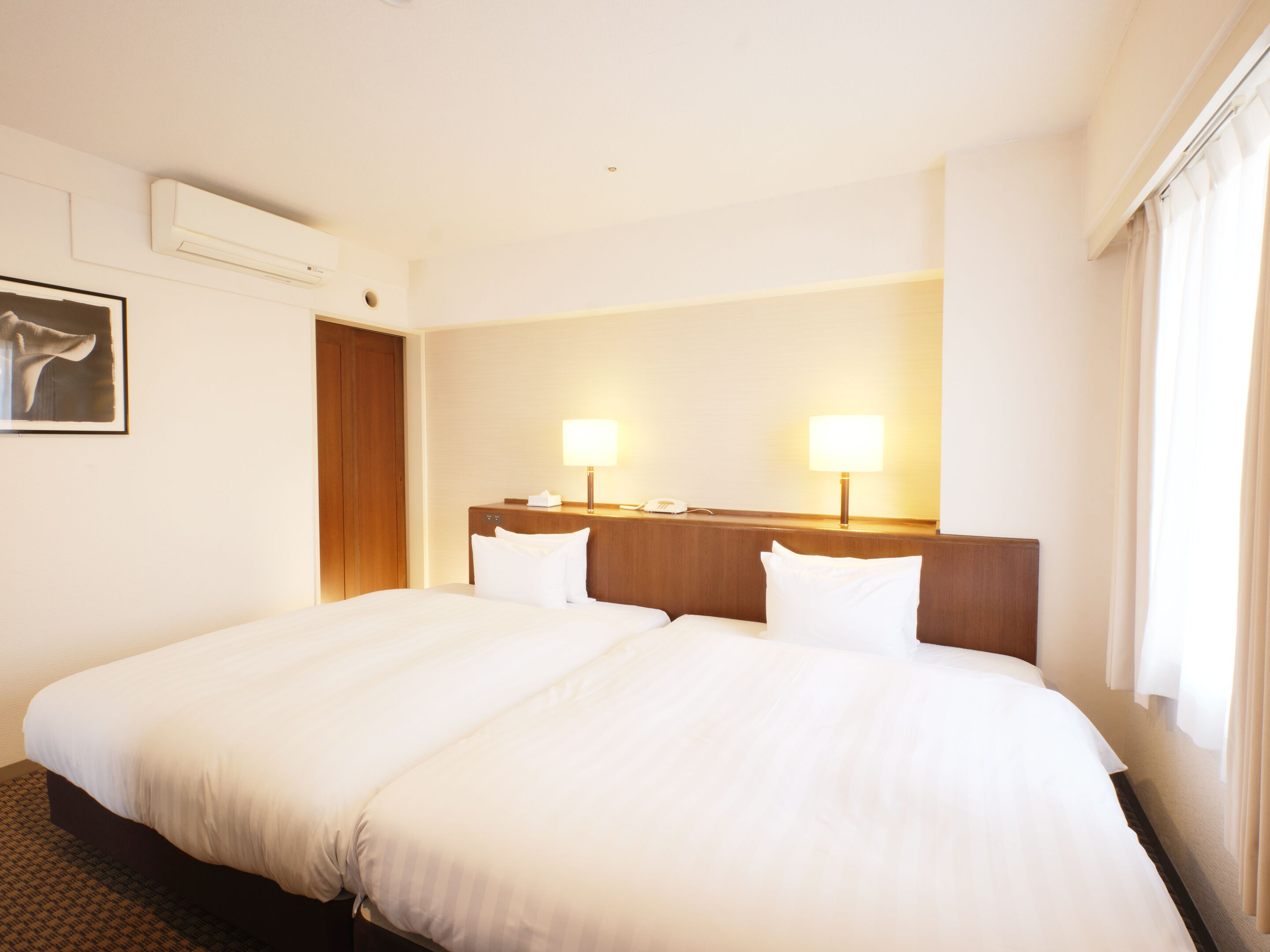 Deluxe-rum | Duntäcken, gratis wi-fi och sängkläder