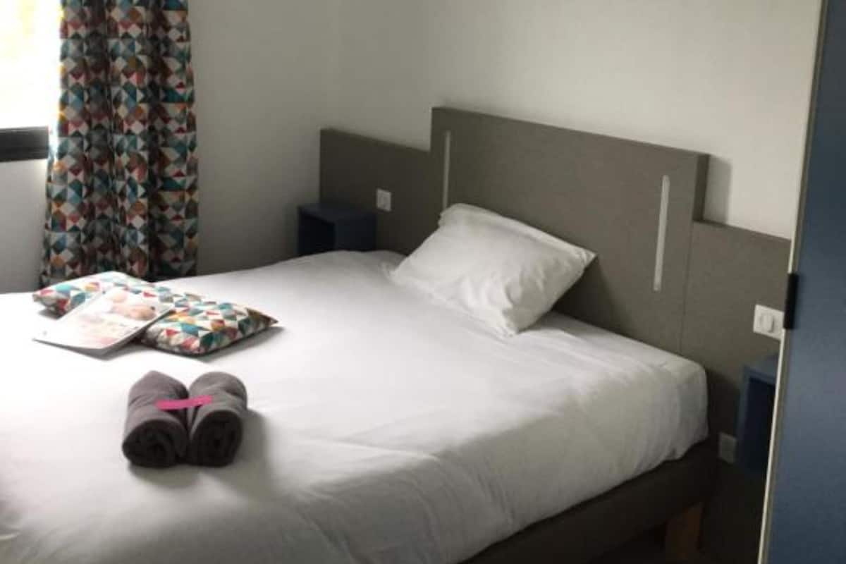 Desk, blackout curtains, soundproofing, iron/ironing board
