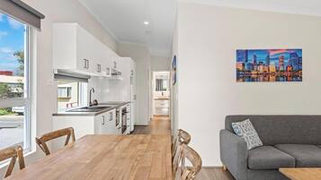 Deluxe 2 Bedroom Cabin - Sleeps 4 | Living area | LCD TV