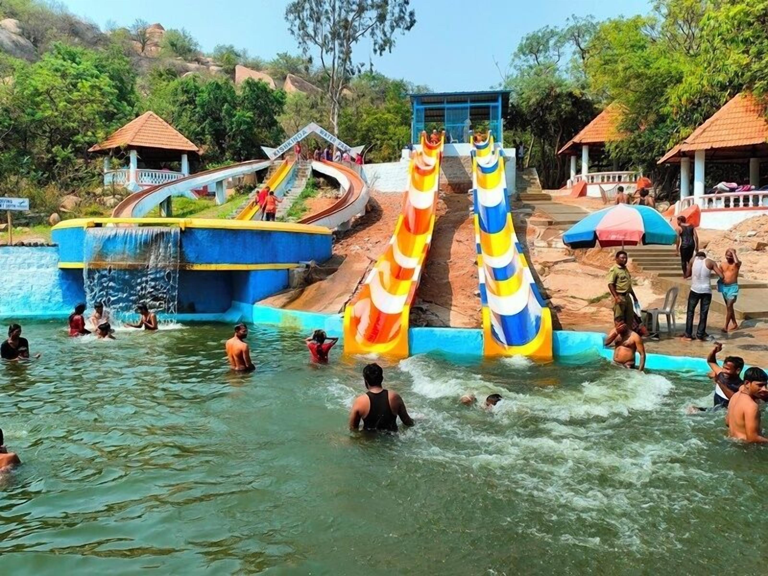 A water park with slides and a pool area.