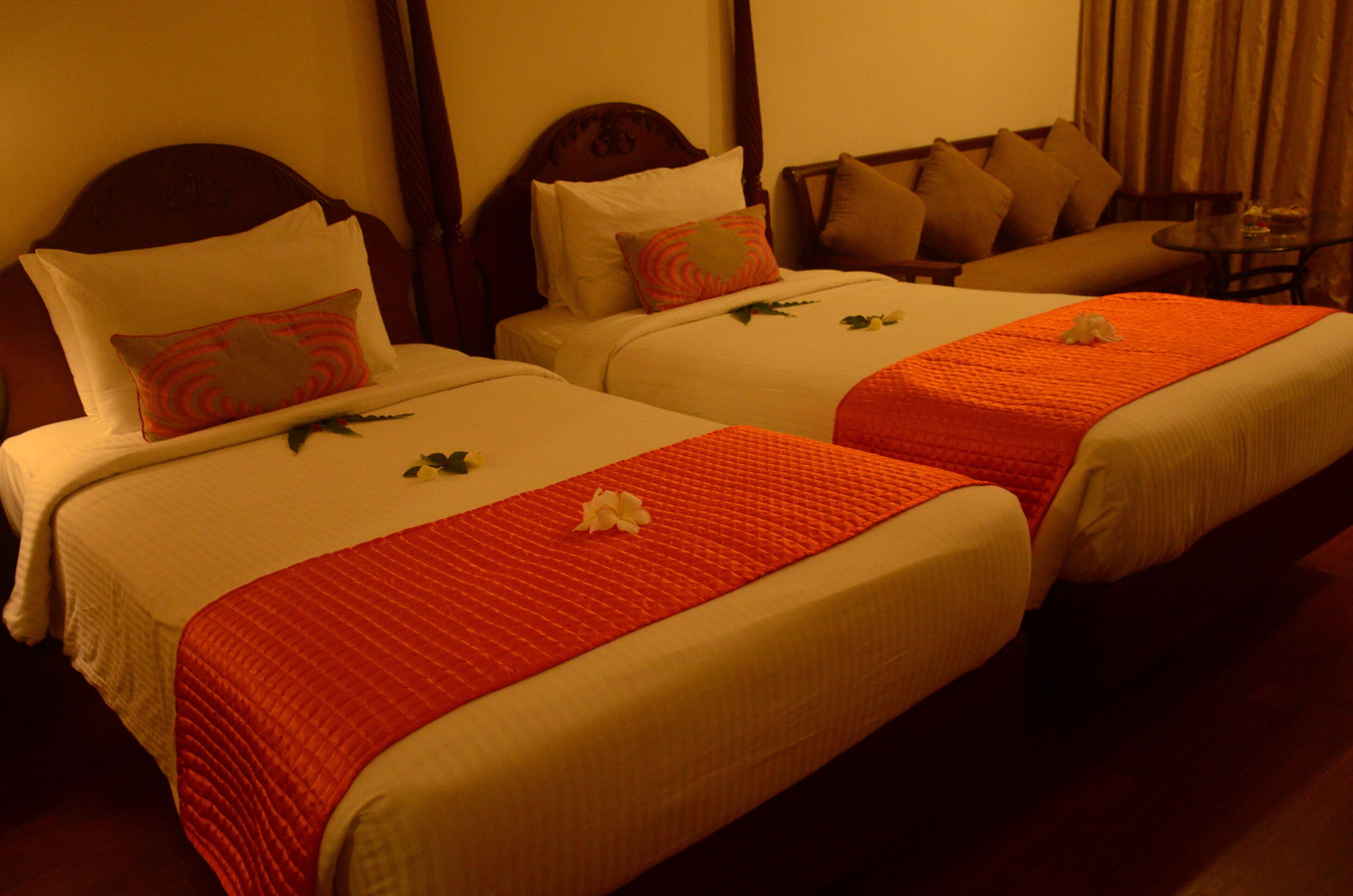deluxe room with pool & garden view on ground floor | in-room safe, desk