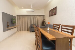 Estudi en suite prèmium | Sala d'estar | Televisor LED 