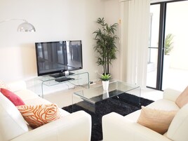 Penthouse, 3 Bedrooms | Living room | Flat-screen TV, DVD player