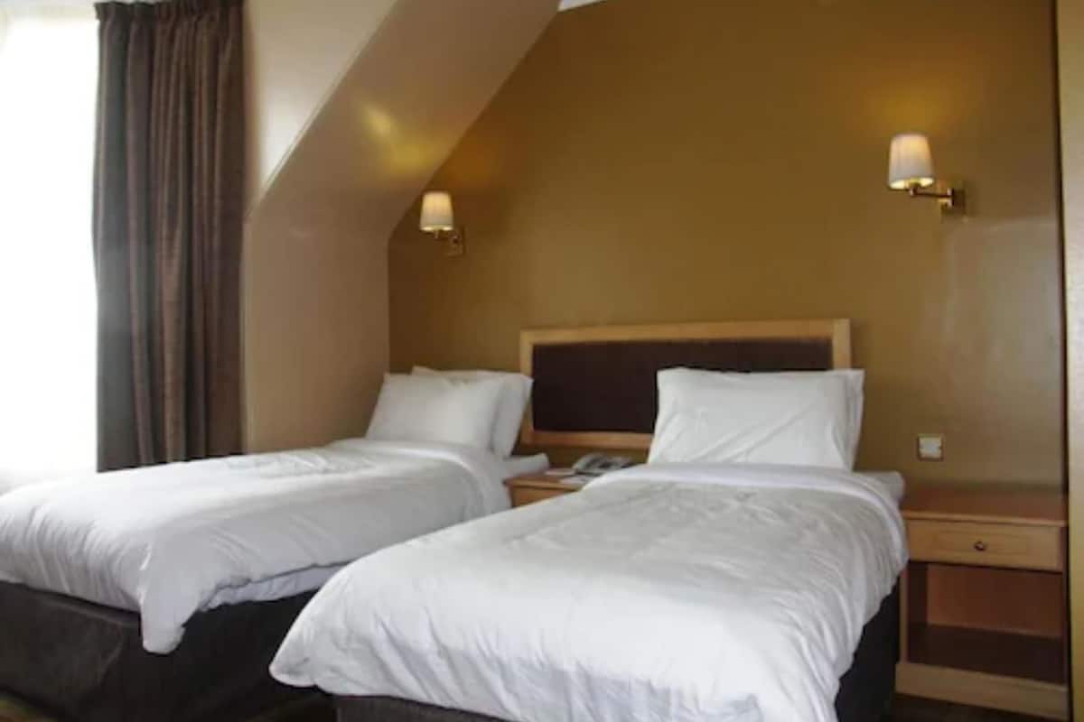 premium bedding, desk, iron/ironing board, free wifi