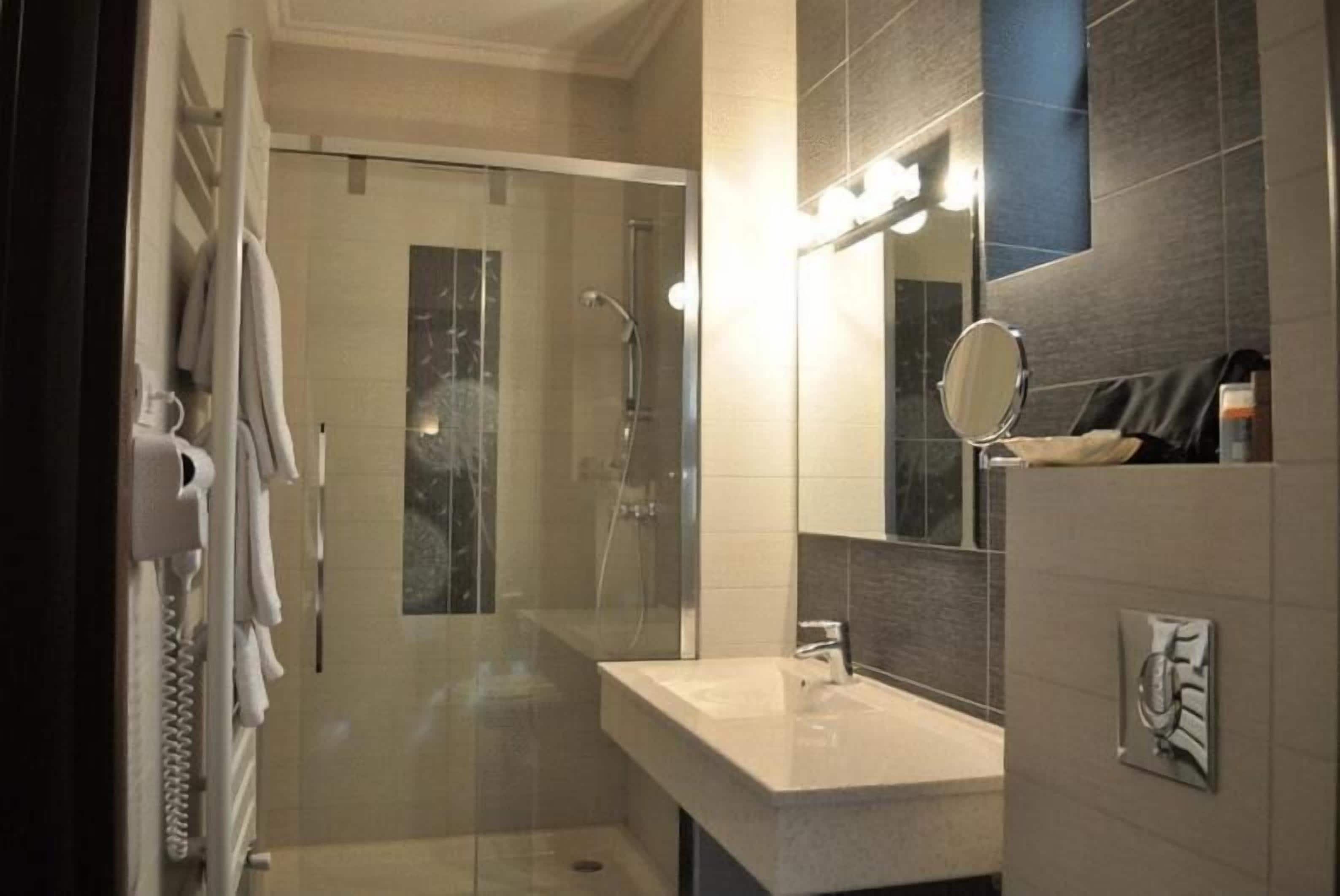 shower, hair dryer, bathrobes, slippers