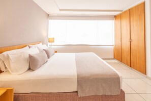 Junior Suite | Minibar, in-room safe, desk, free WiFi - Basic Hotel Centenario by Hoteles MS (Cali)