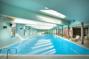2 indoor pools, seasonal outdoor pool, pool umbrellas, pool loungers