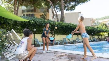 Outdoor pool, pool umbrellas, pool loungers