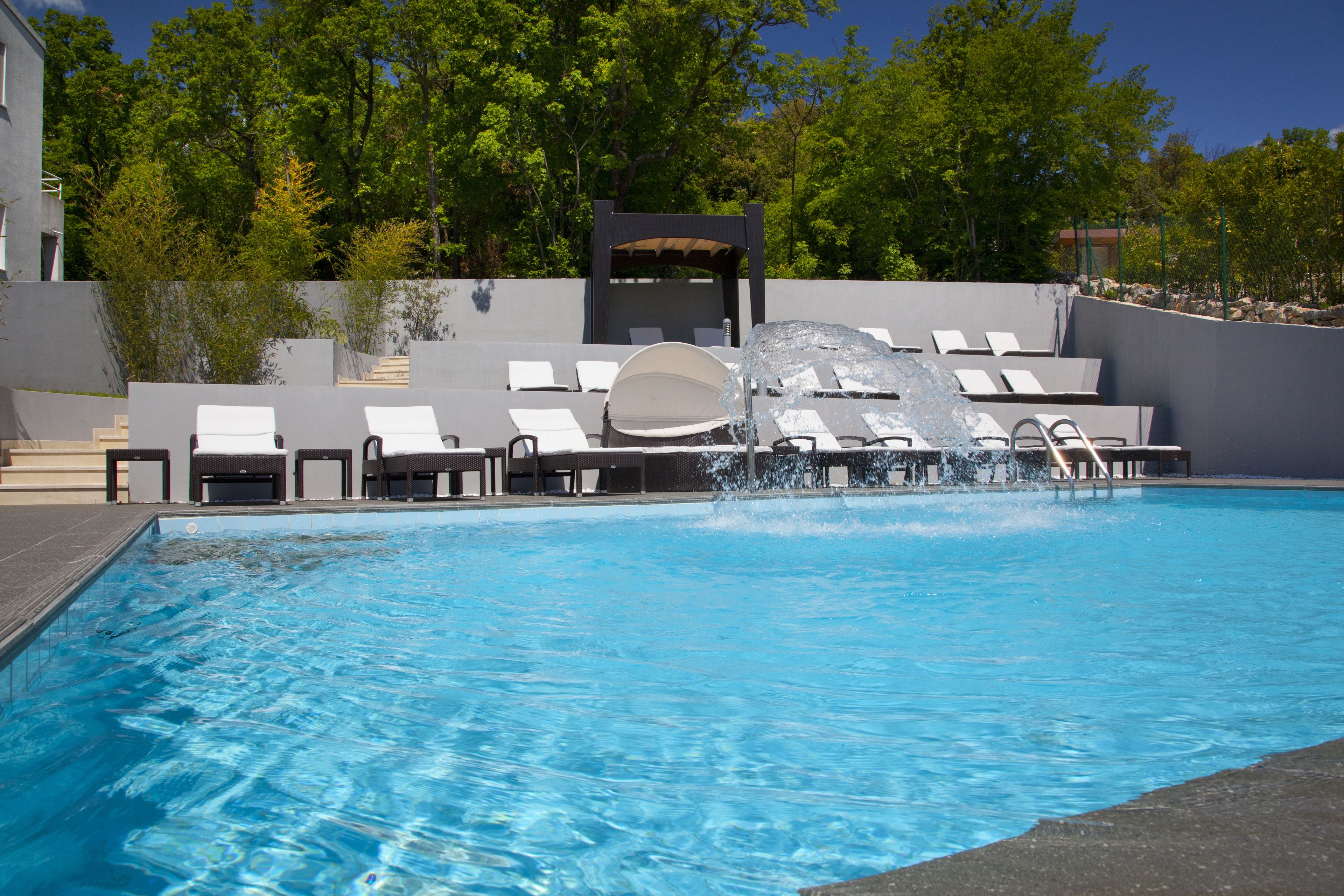 outdoor pool, pool umbrellas, pool loungers