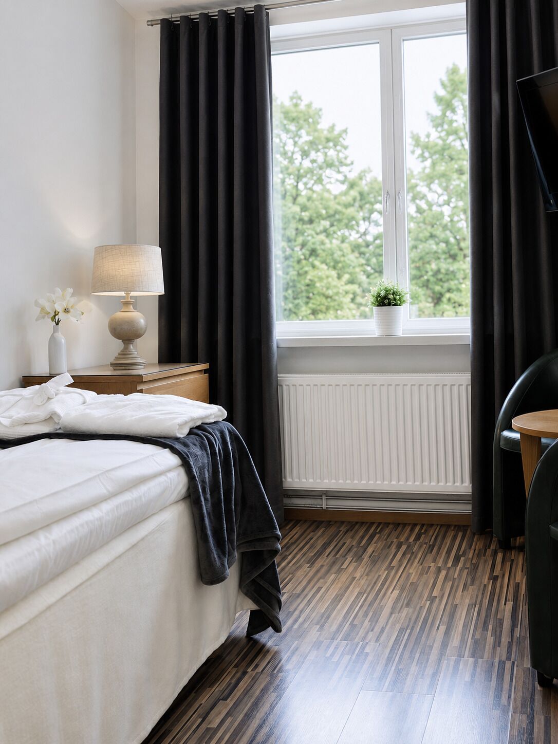 Eenpersoonskamer | Verduisterende gordijnen, geluiddichte muren, gratis babybedden