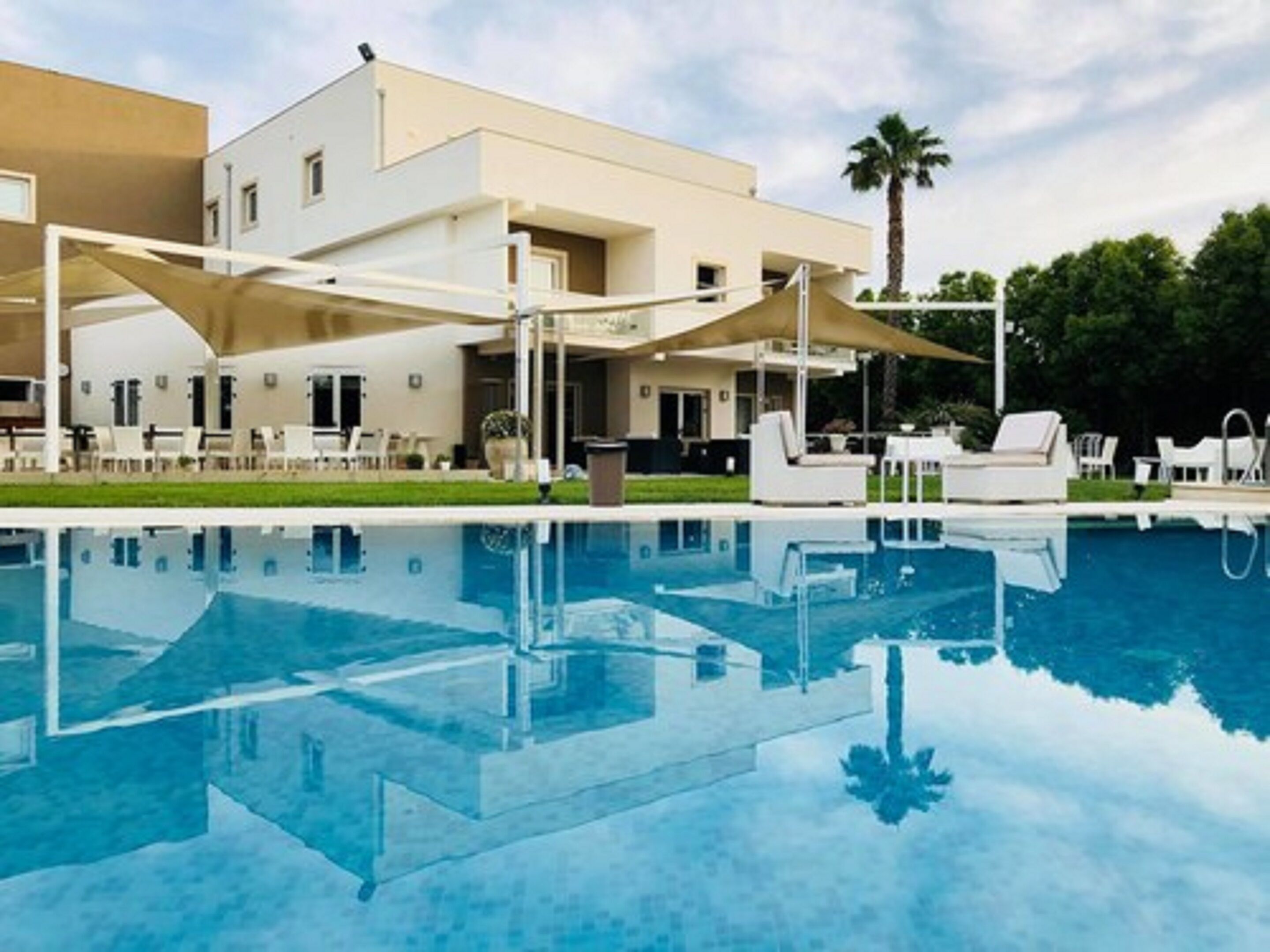 2 outdoor pools, pool umbrellas, sun loungers