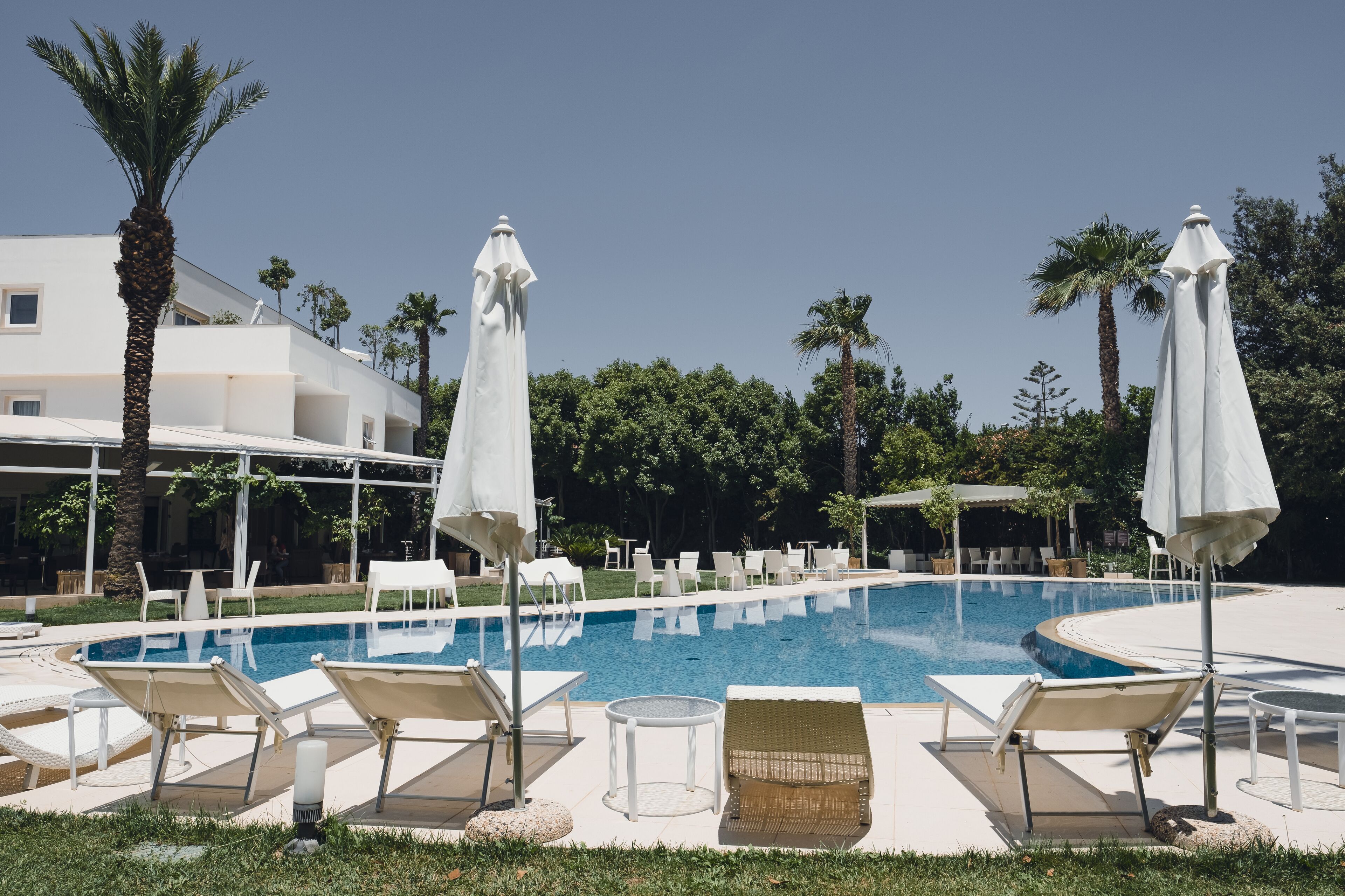 2 outdoor pools, pool umbrellas, pool loungers