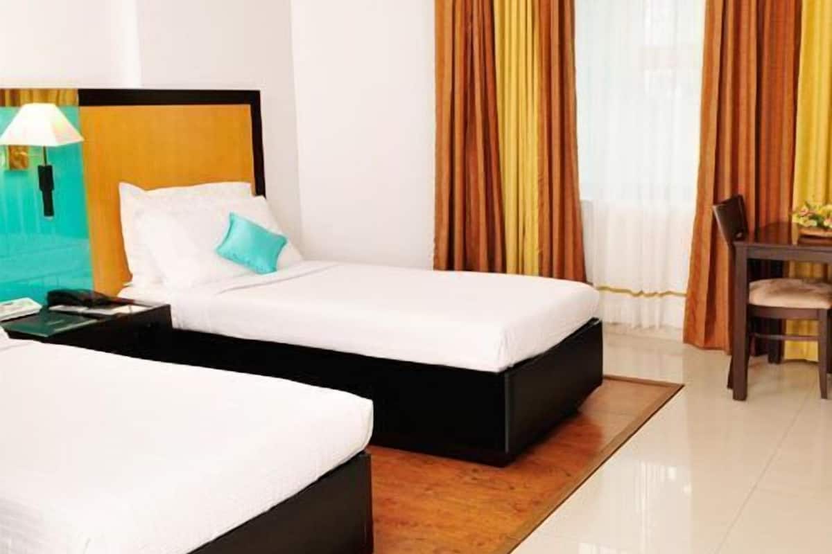 premium bedding, memory-foam beds, minibar, in-room safe