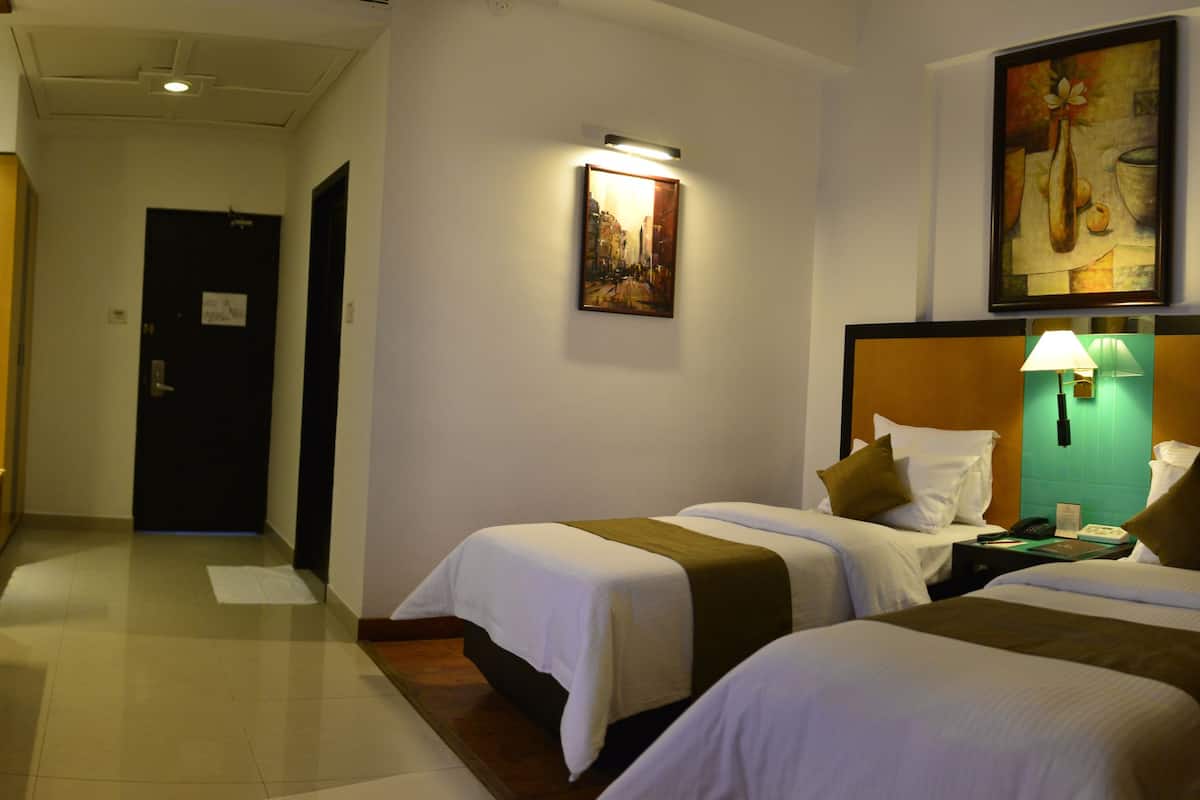 executive single room | premium bedding, memory-foam beds, minibar, in-room safe