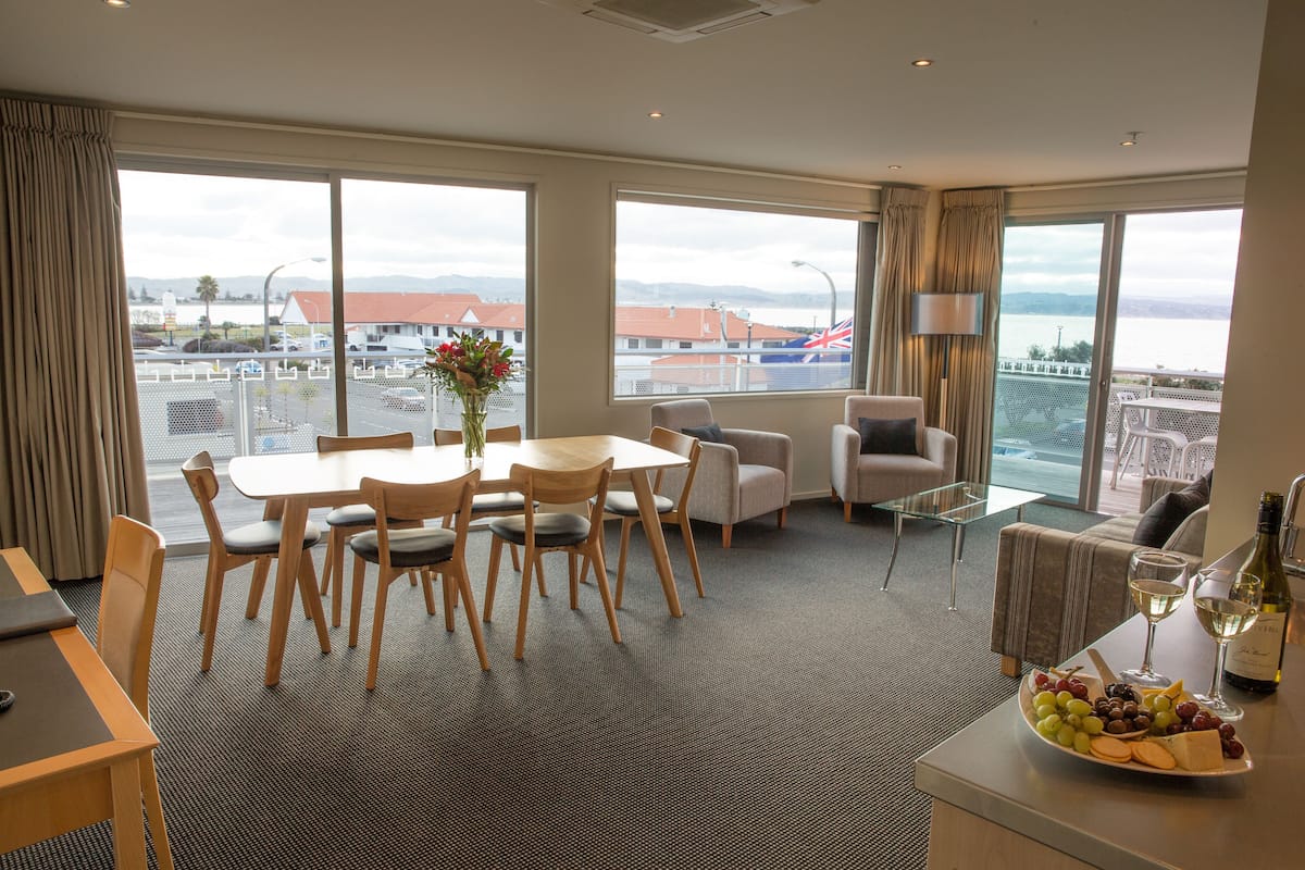 Premium Suite, 2 Bedrooms | Living area | LCD TV, DVD player, iPod dock