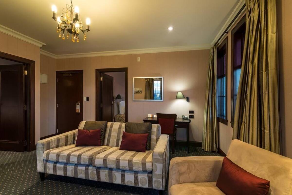 Heritage Suite, 2 Bedrooms | Living area | LCD TV, DVD player