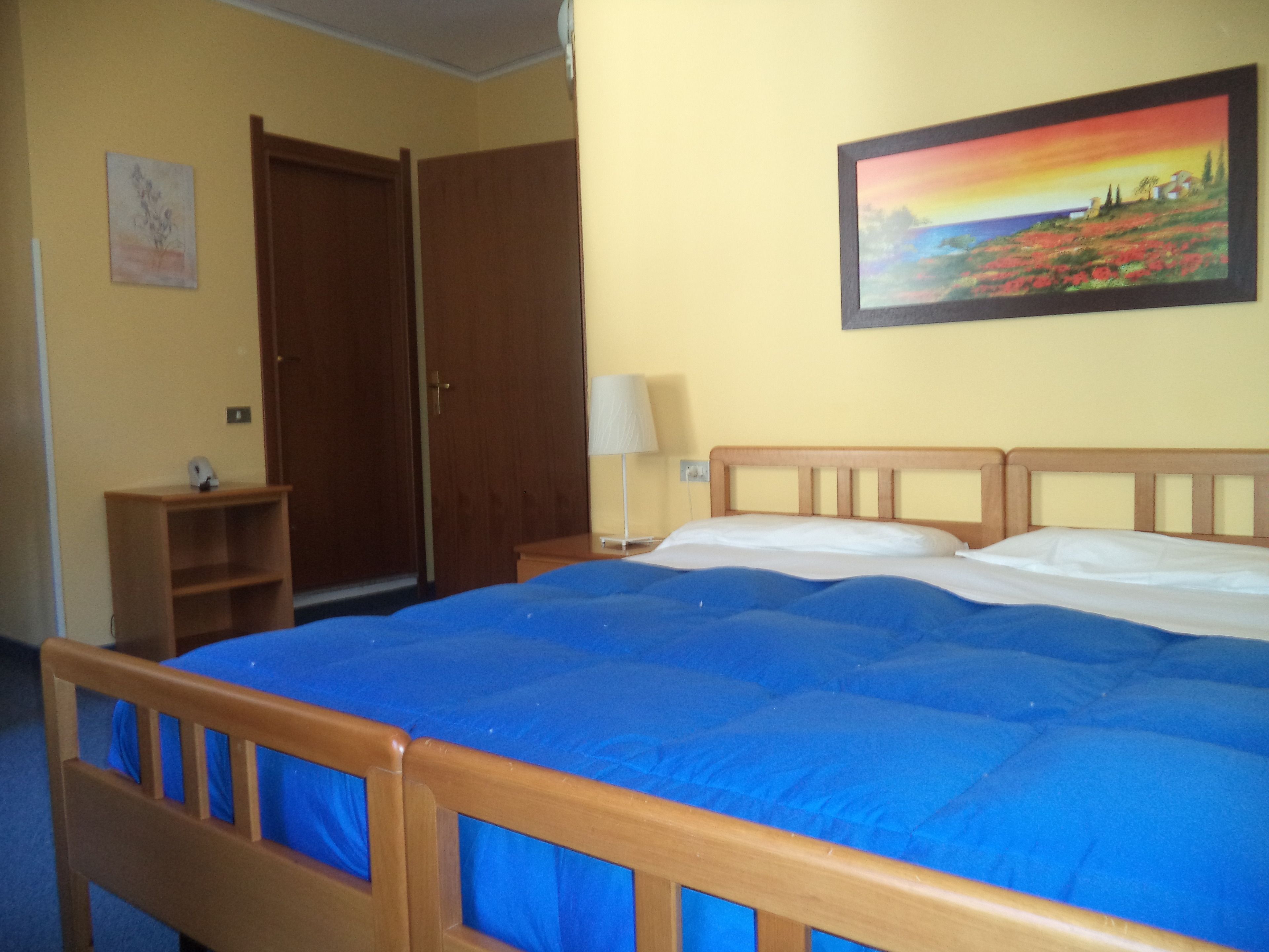 quadruple room, 1 bedroom, private bathroom | in-room safe, desk, rollaway beds, free wifi