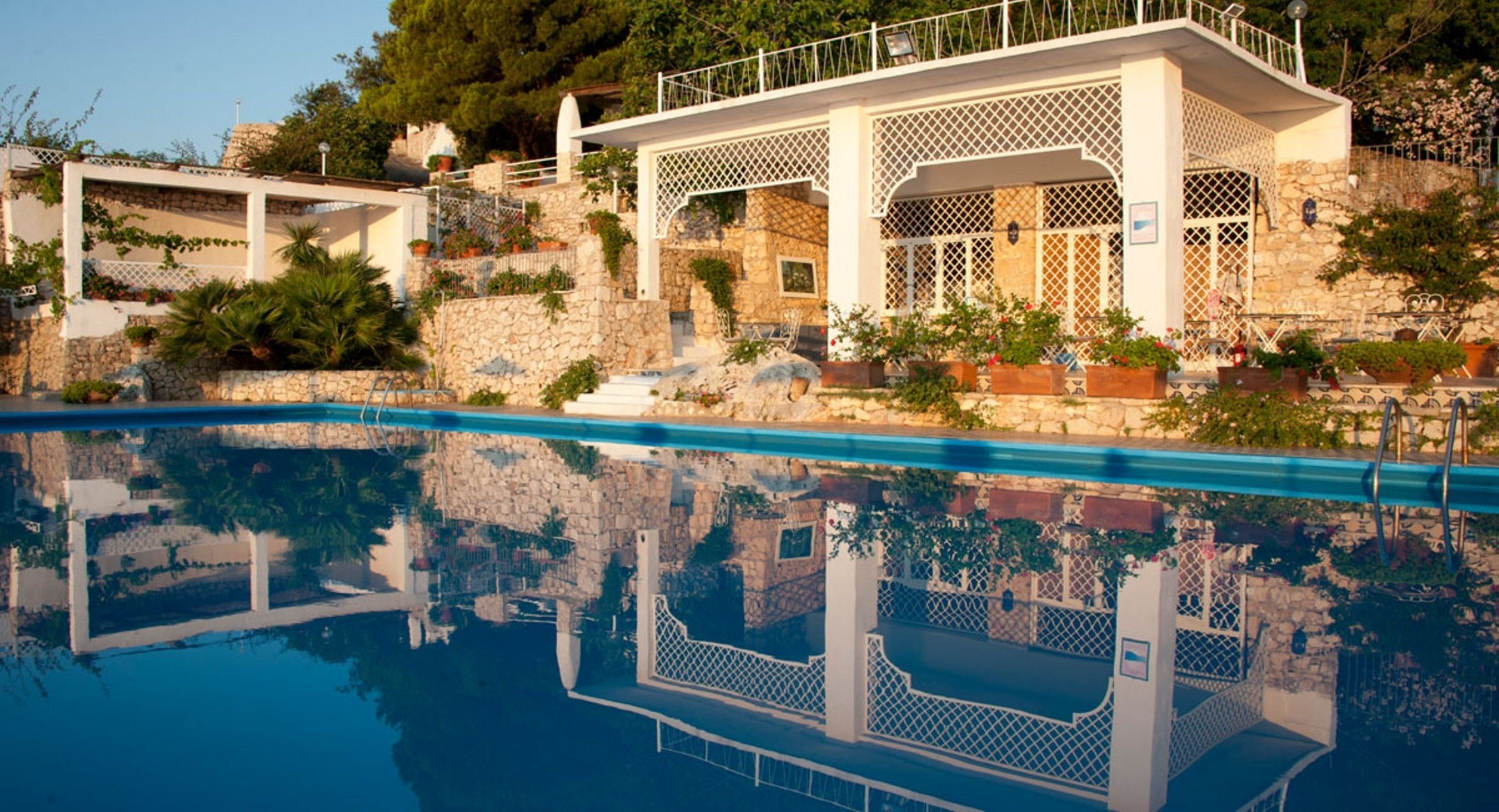 seasonal outdoor pool, pool umbrellas, pool loungers