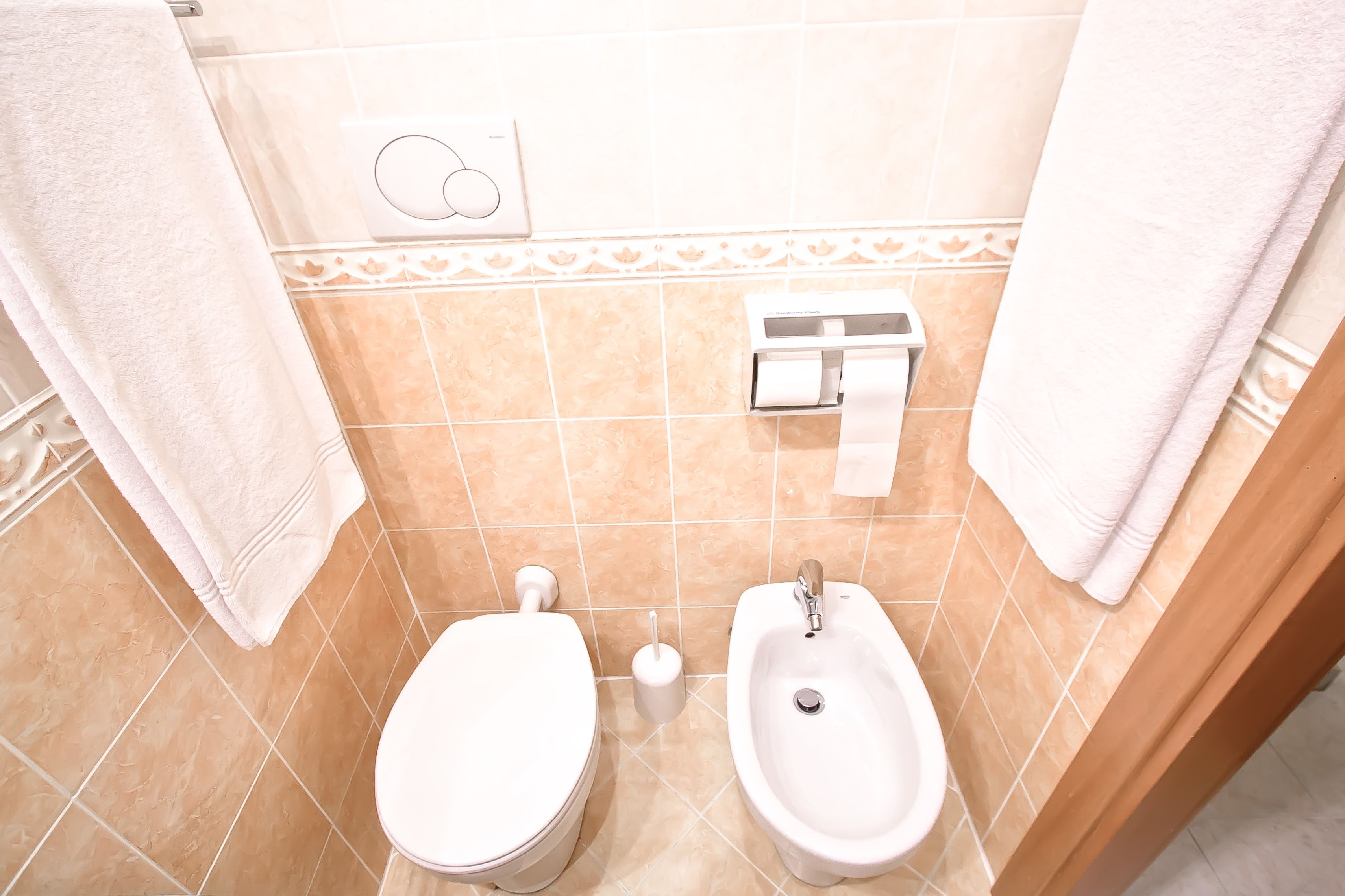 bathroom | hair dryer, bidet, towels