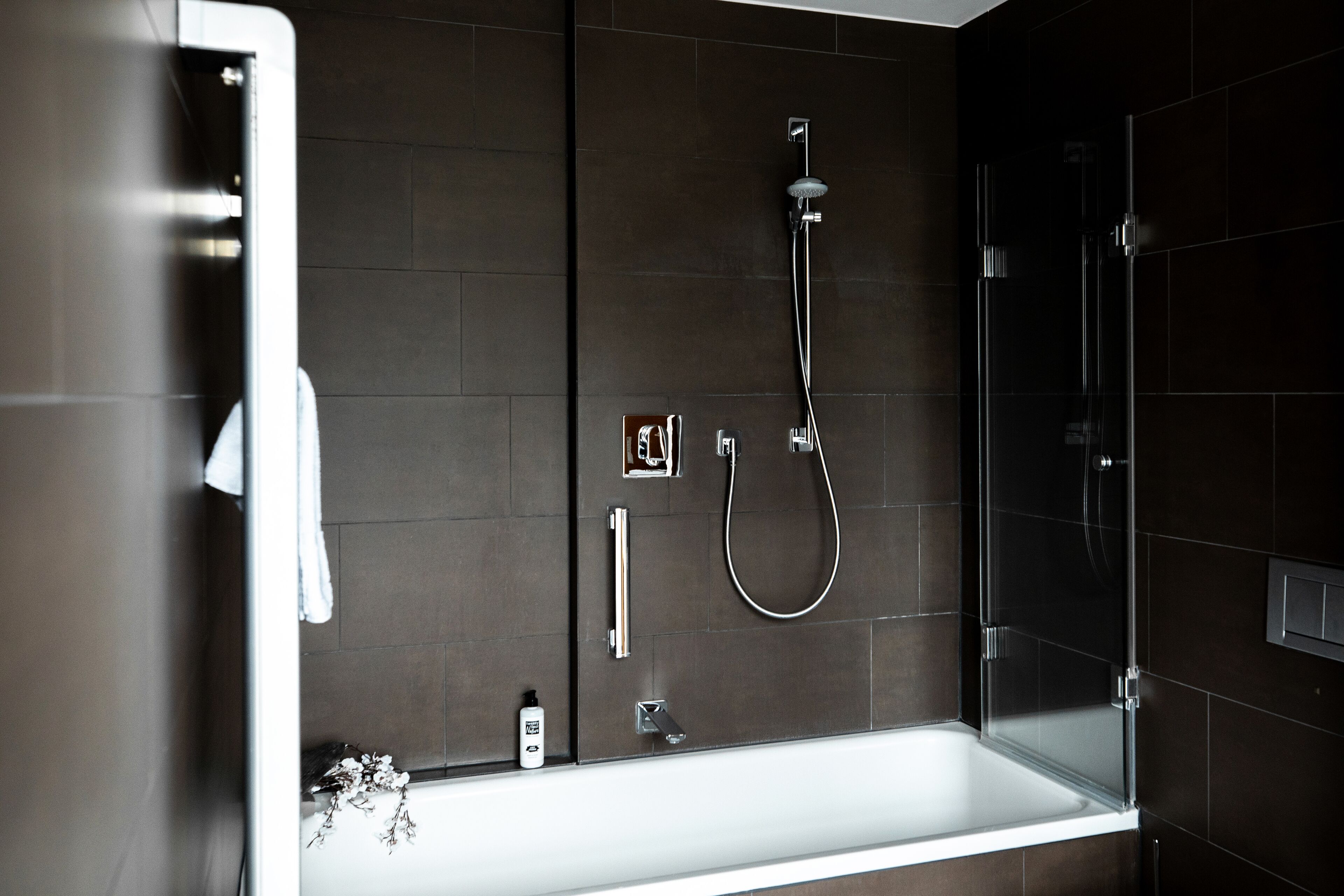 junior suite | bathroom | hair dryer, bathrobes, slippers, towels