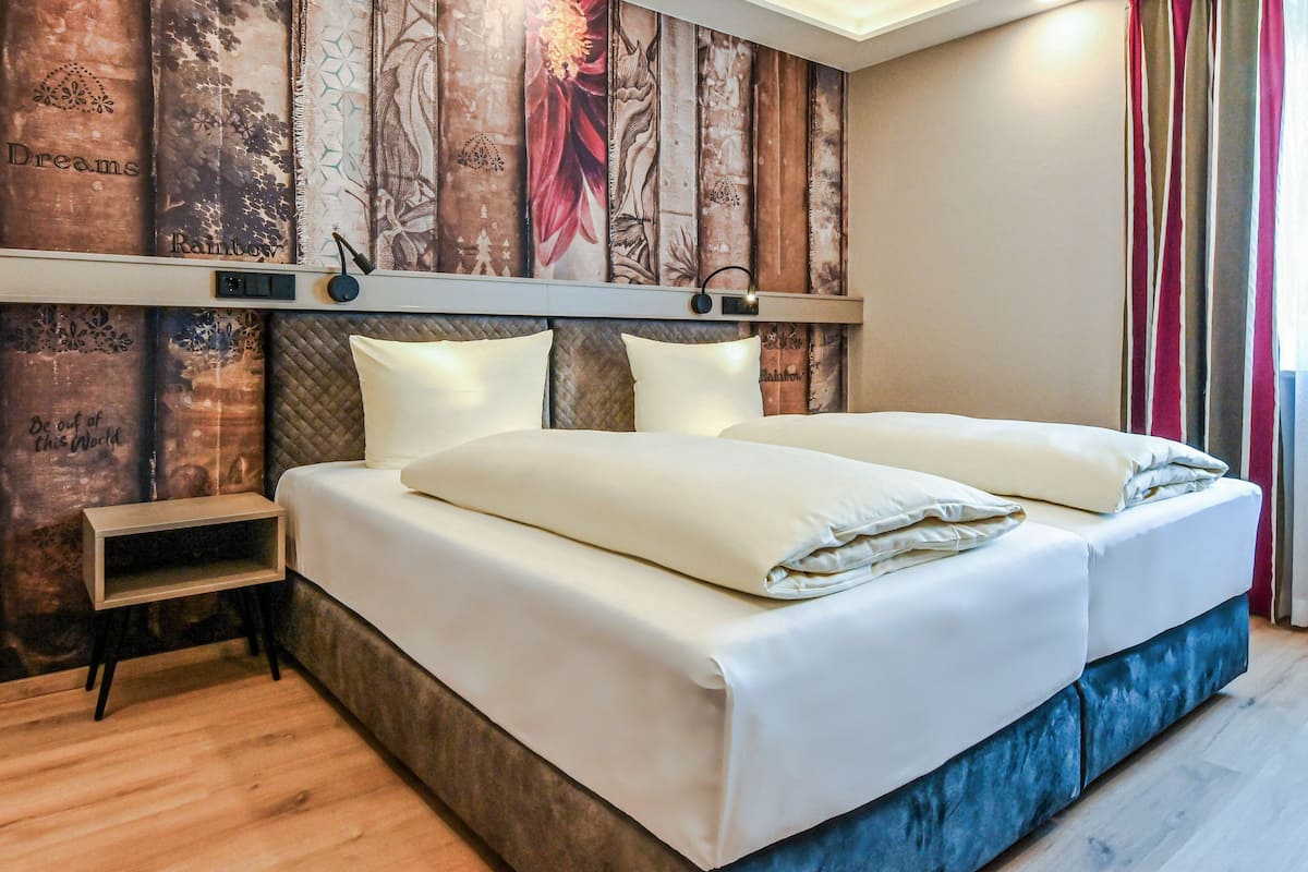Basic Double Room | In-room safe, individually decorated, desk, laptop workspace