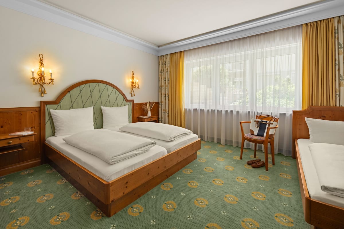 Family Triple Room | In-room safe, individually decorated, desk, laptop workspace