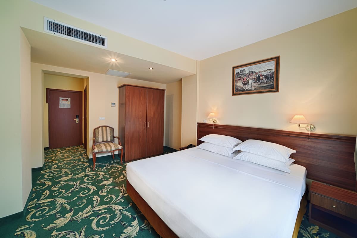 エグゼクティブ ダブルルーム | エジプト綿のシーツ、高級寝具、低反発ベッド、ミニバー