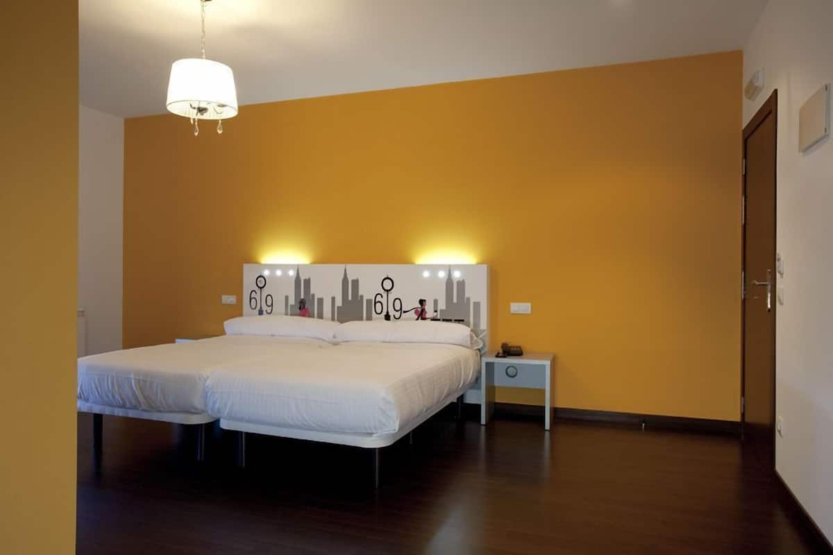 Family Triple Room, 1 Bedroom | Down duvets, minibar, individually furnished, desk