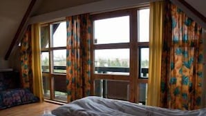 スーペリア ダブルルーム 共用バスルーム | 部屋からの景観