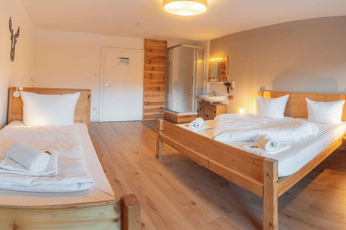 Quadruple Room, Non Smoking, Shared Bathroom | Individually decorated, individually furnished, WiFi, bed sheets