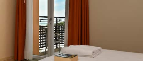 Double Room, Balcony | Minibar, in-room safe, desk, blackout curtains