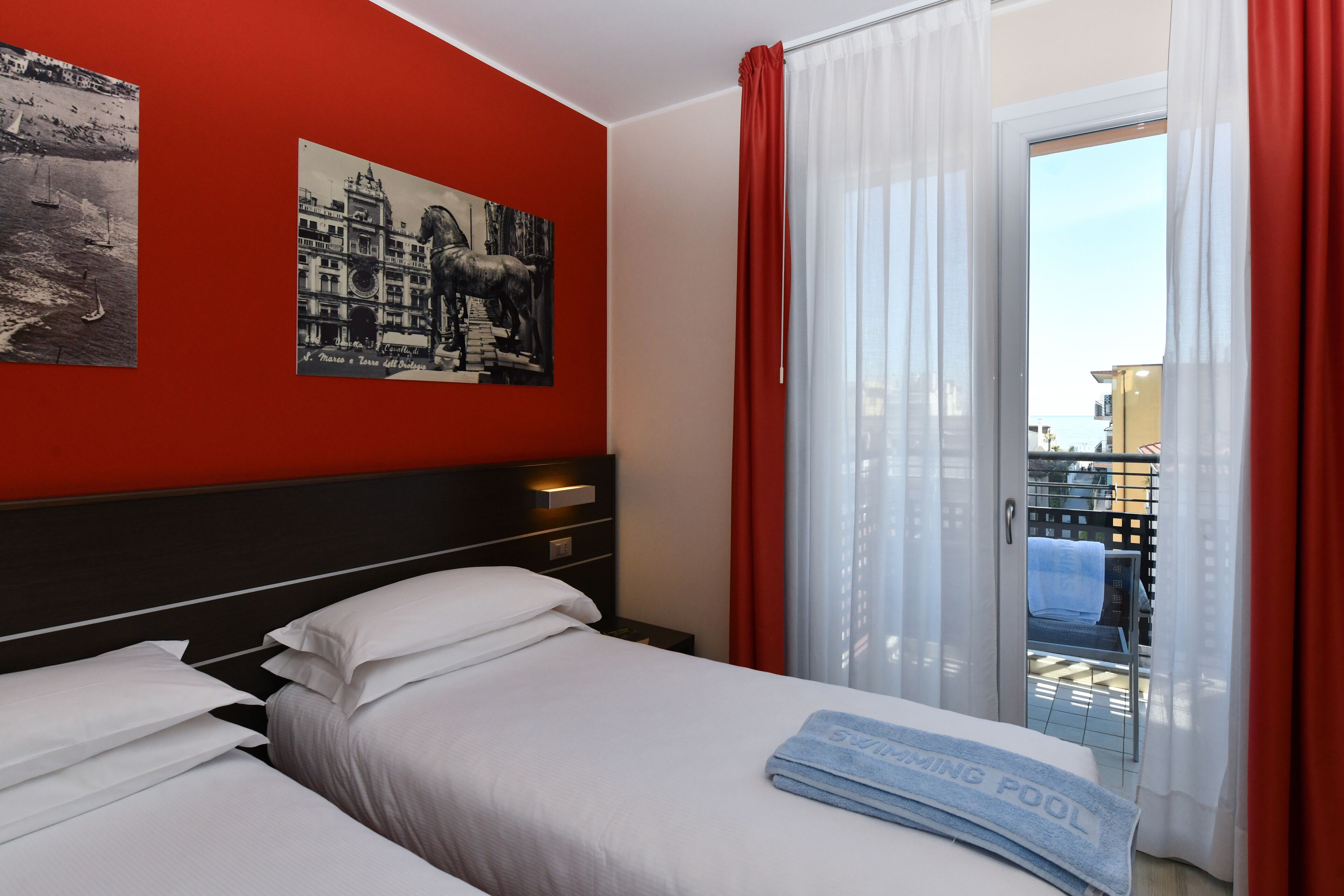 double room, balcony | minibar, in-room safe, desk, blackout curtains