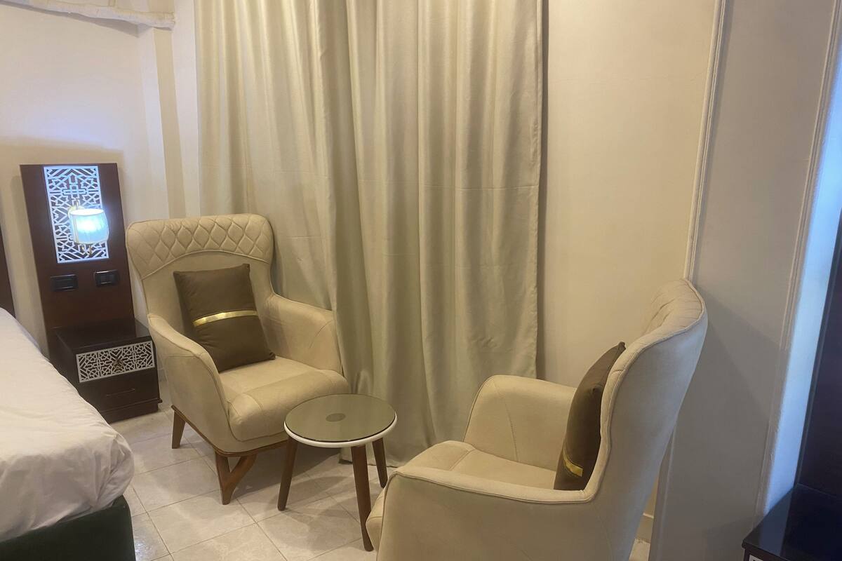 suite | premium bedding, minibar, blackout curtains, rollaway beds