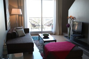 Design Loft | Living area | 32-inch LCD TV with cable channels, TV, DVD player