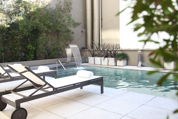 Outdoor pool, sun loungers