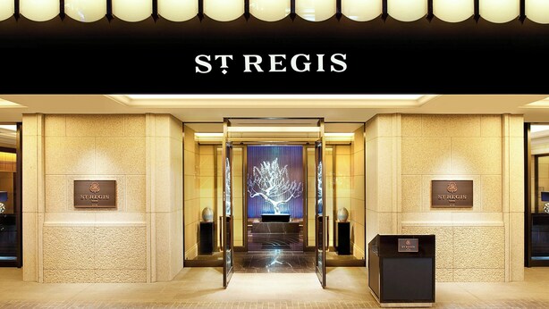 The entrance of St. Regis hotel with a grand reception area, a chandelier, and a sign above the doors. - The St. Regis Osaka (Osaka)