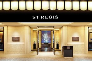 The entrance of St. Regis hotel with a grand reception area, a chandelier, and a sign above the doors. - The St. Regis Osaka (Osaka)