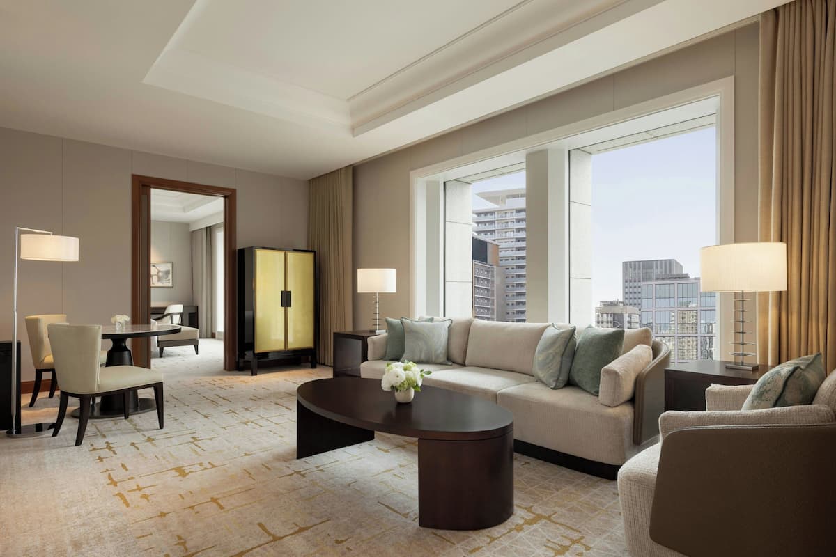 Suite, 1 King Bed, City View | Living room | 42-inch flat-screen TV with digital channels, TV, DVD player