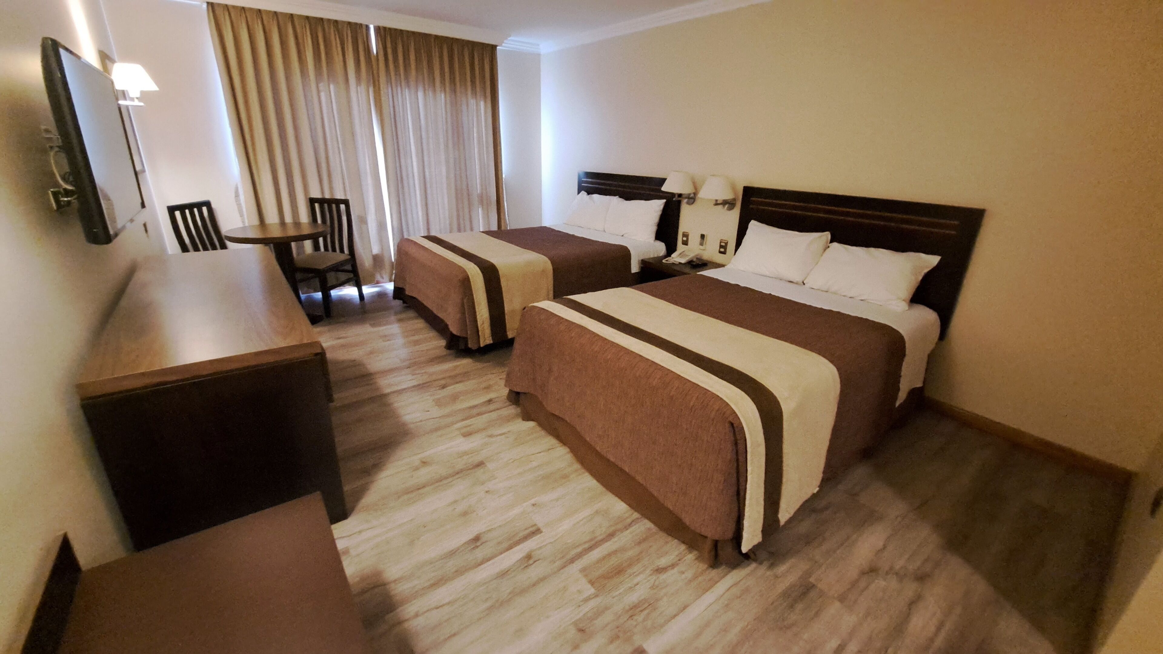 double room, city view | minibar, in-room safe, desk, blackout curtains