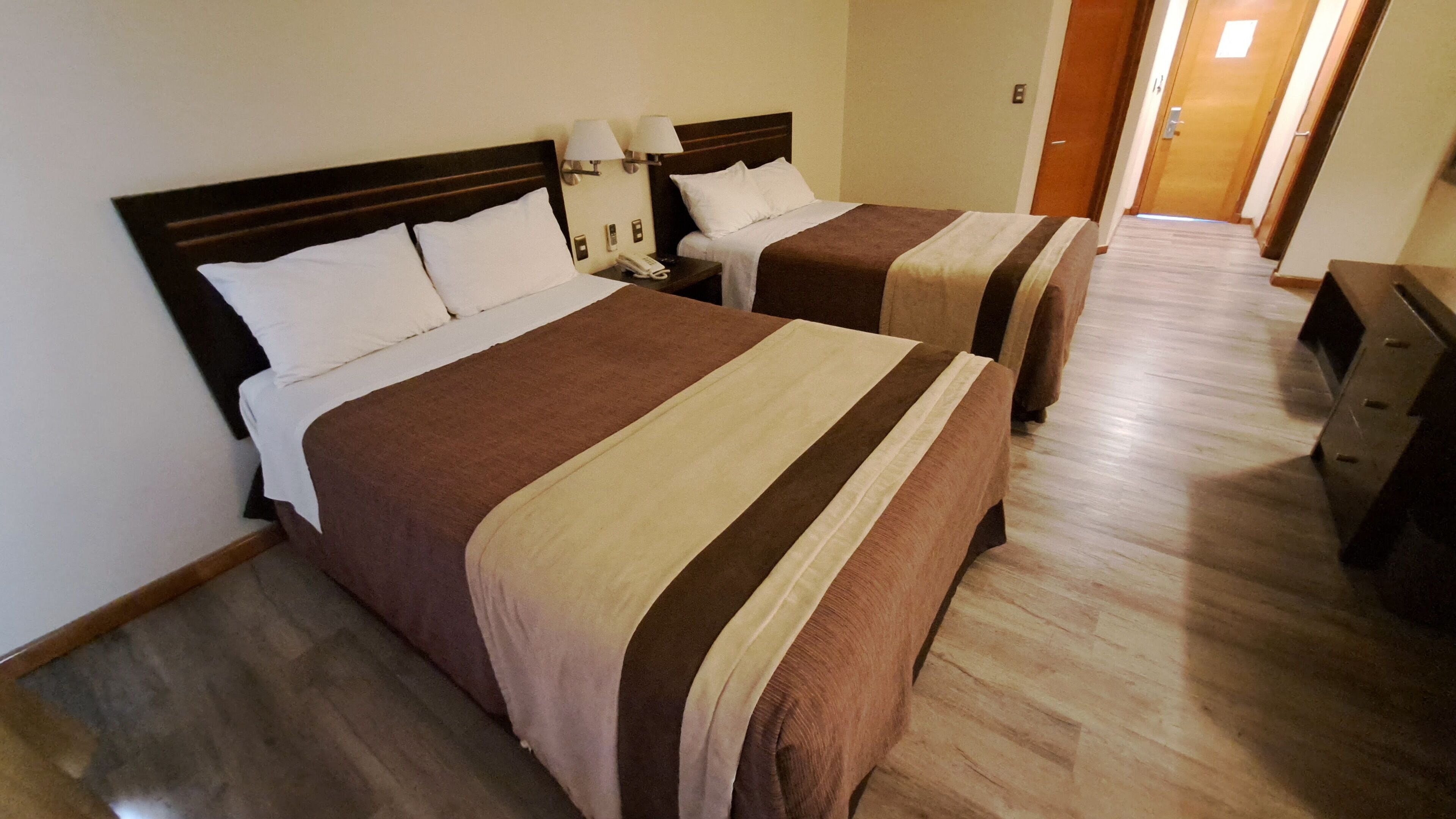 double room, city view | minibar, in-room safe, desk, blackout curtains