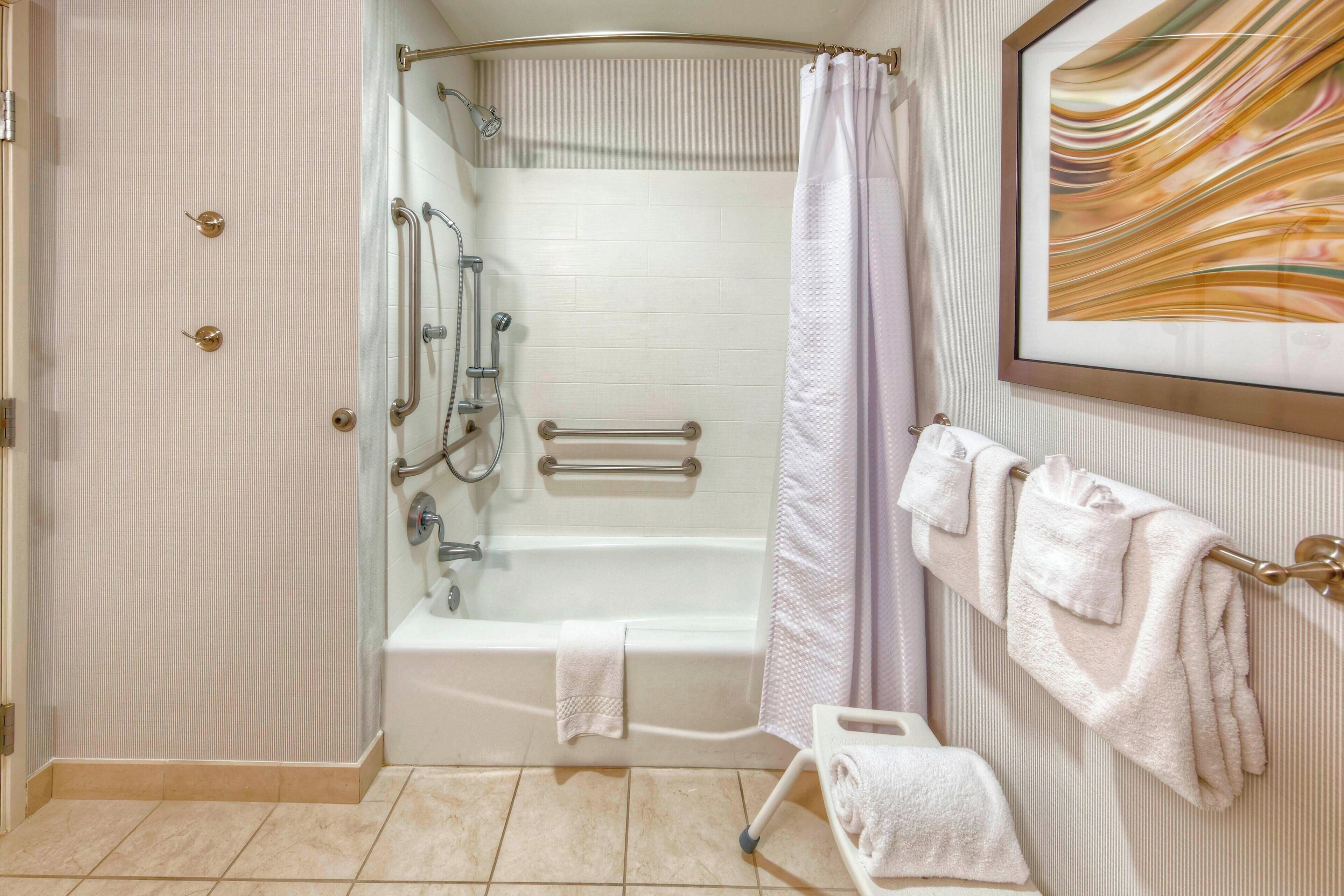 combined shower/bathtub, free toiletries, hair dryer, towels