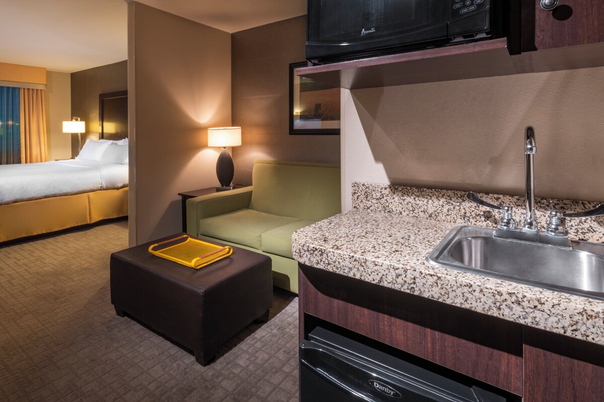 Suite, 1 King Bed | In-room safe, desk, iron/ironing board, WiFi (free)