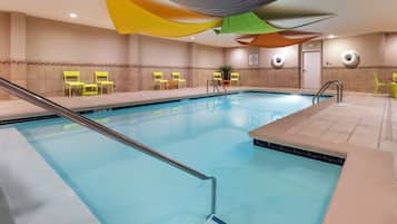 Indoor pool, open 7 AM to 10 PM, sun loungers