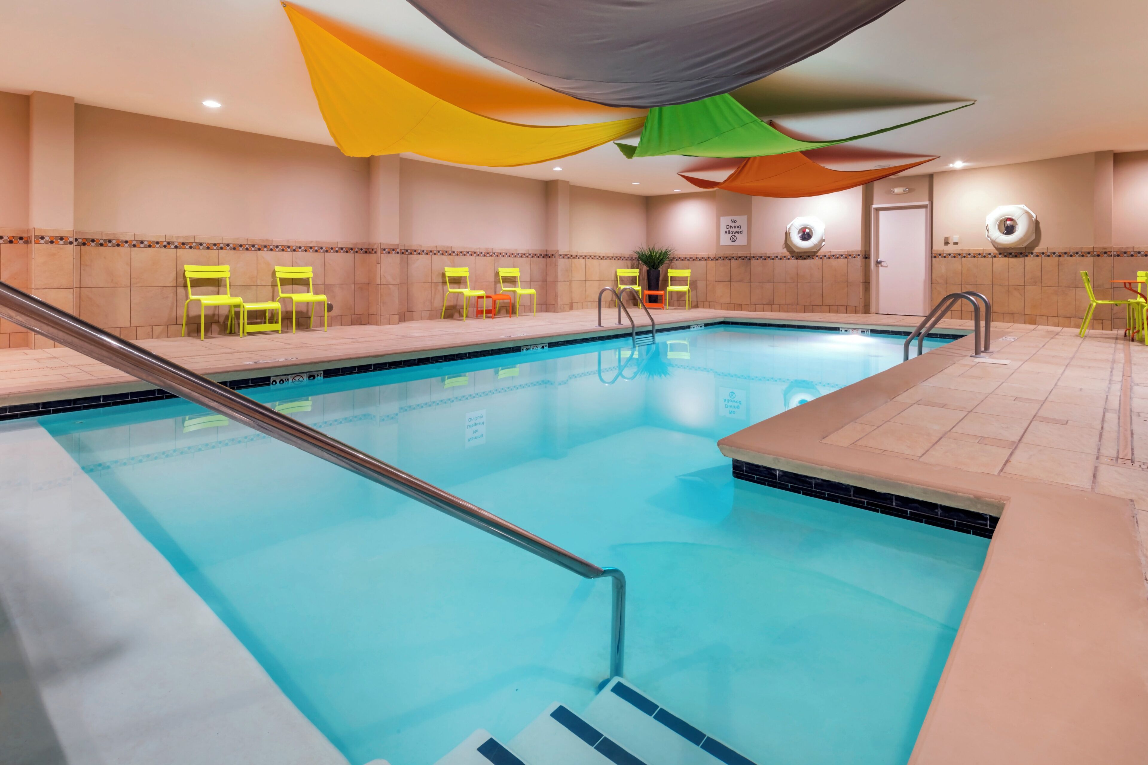 Indoor pool, open 7 AM to 10 PM, sun loungers