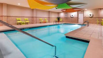 Indoor pool, open 7 AM to 10 PM, sun loungers