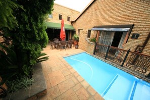 Outdoor pool, open 8 AM to 8 PM, sun loungers