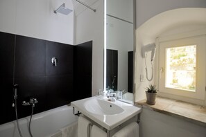 Superior Double Room | Bathroom | Combined shower/tub, deep soaking tub, free toiletries, hair dryer