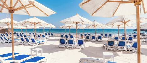 Playa privada, toallas de playa