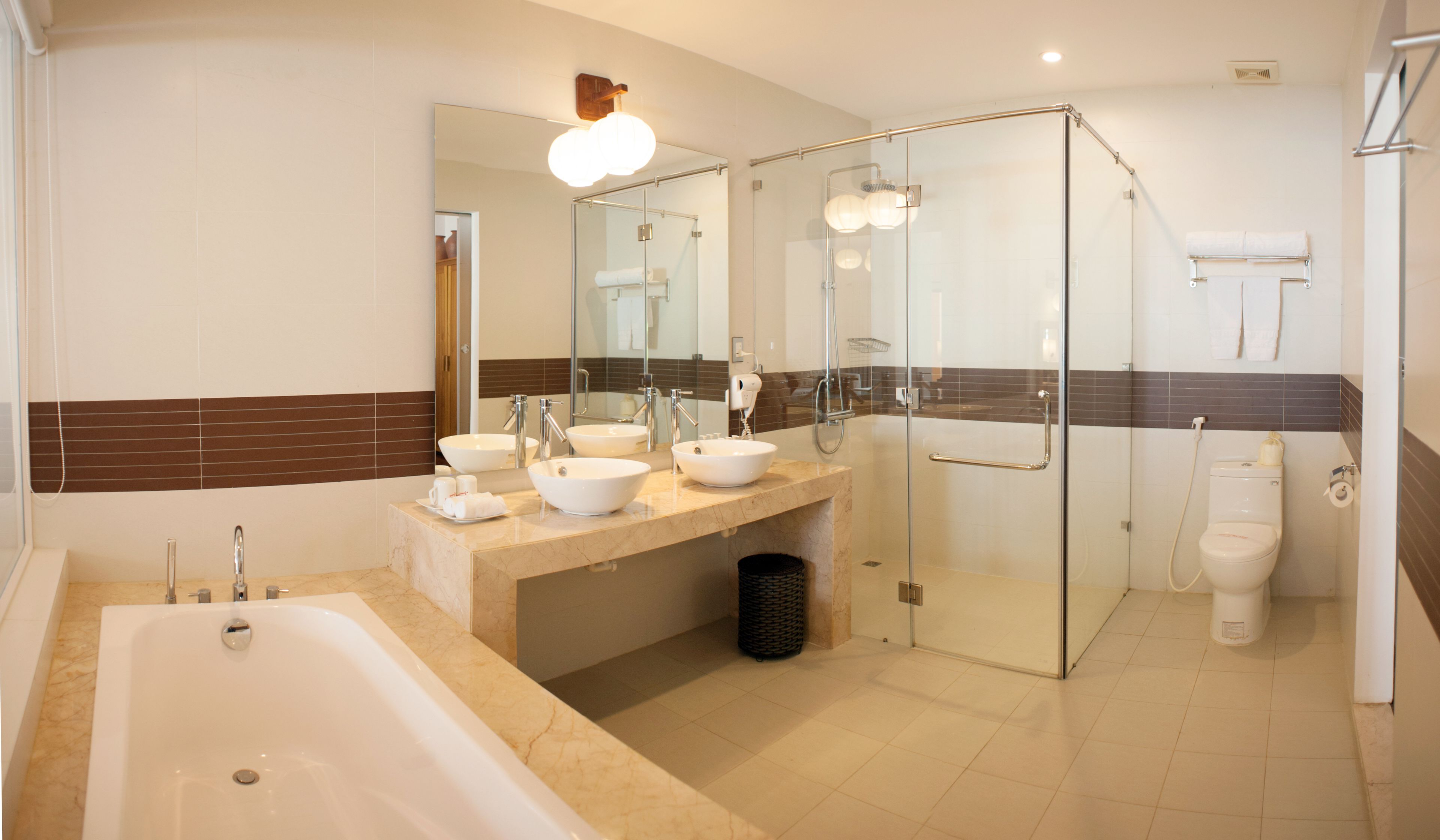 hair dryer, bathrobes, slippers, bidet